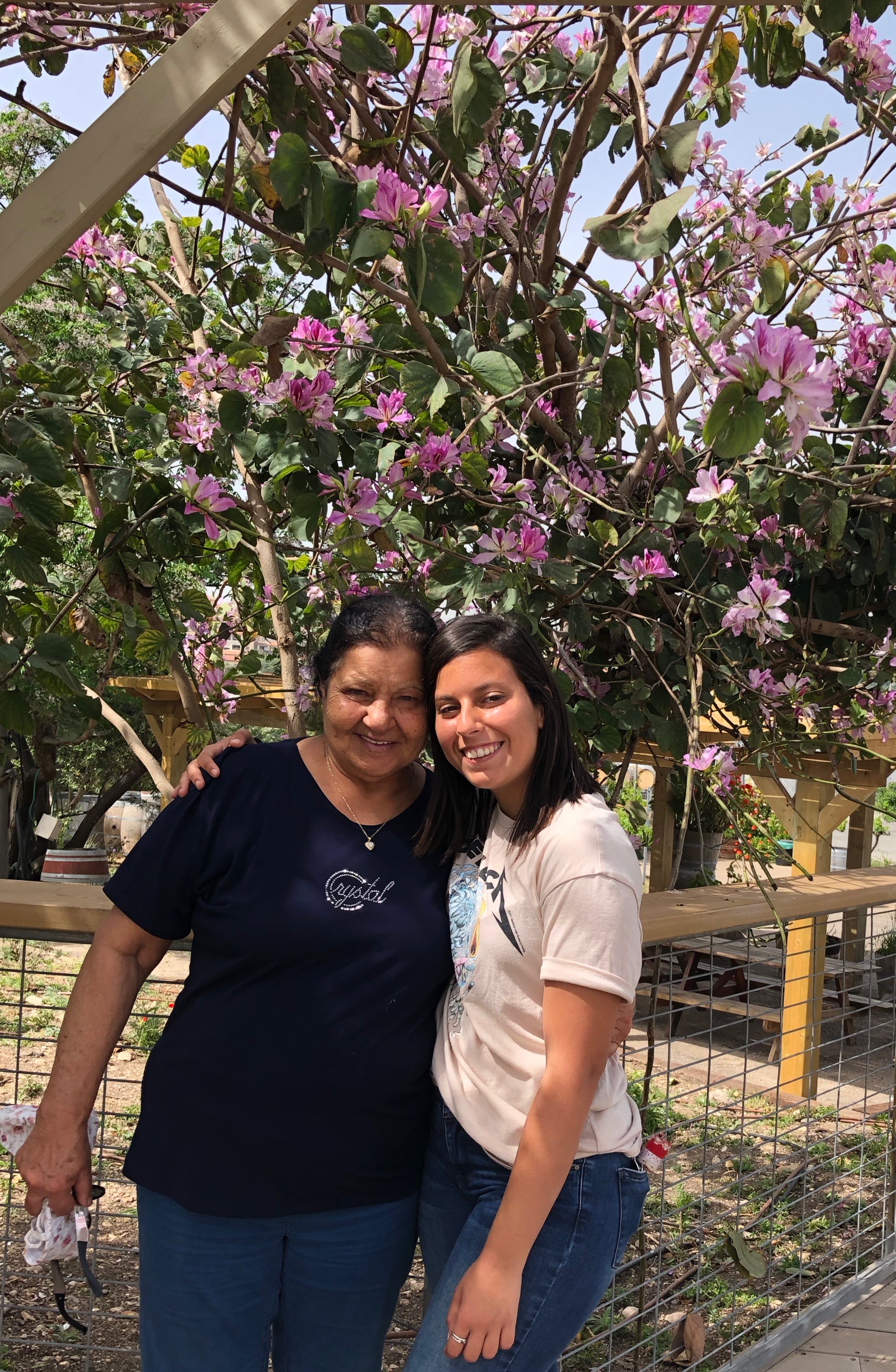 My niece, Yalee and my mother in front of the village’s petting zoo