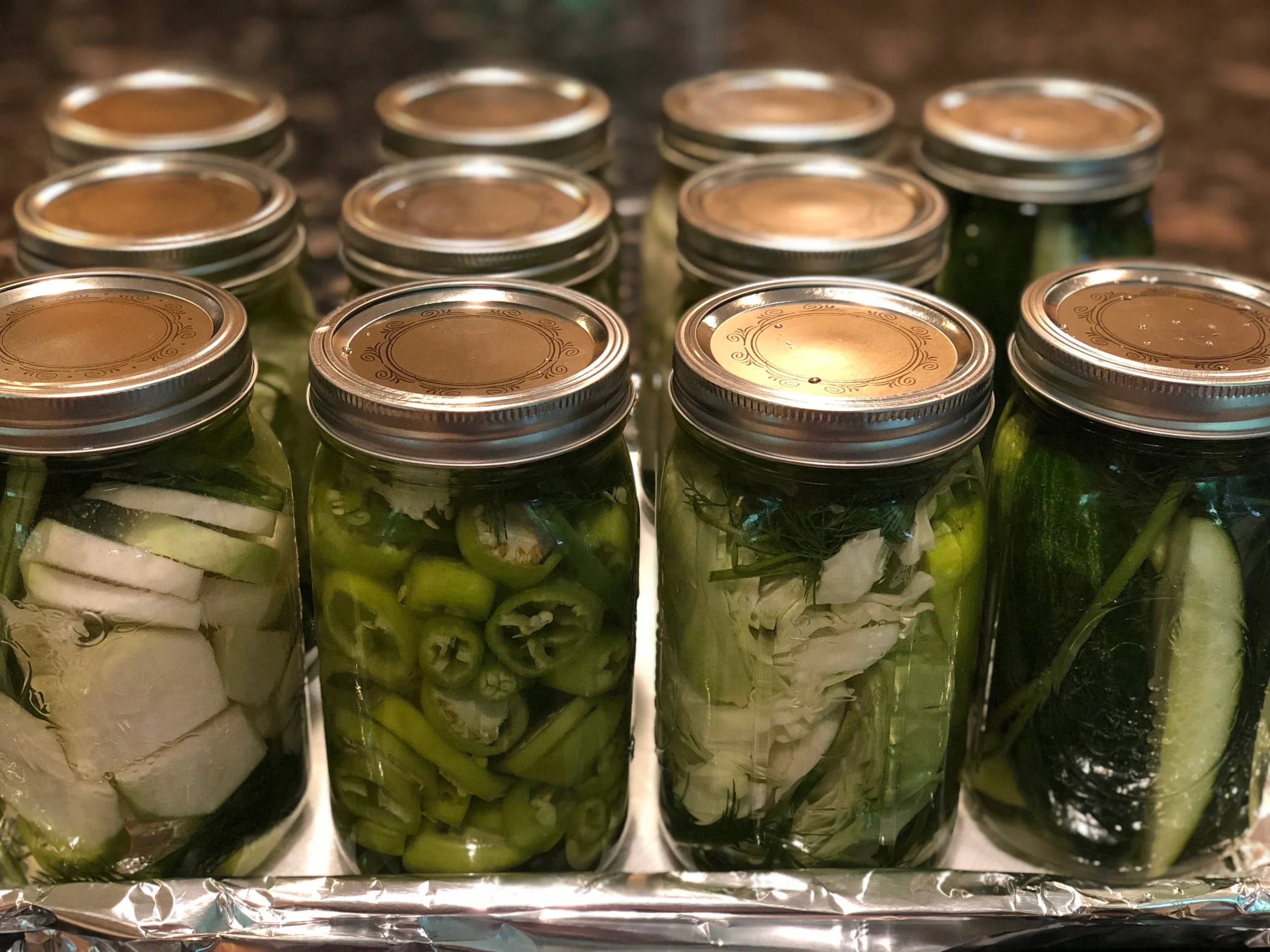 Various Dill Pickles (R to L): Cucumbers, white cabbage, banana peppers and kohlrabi