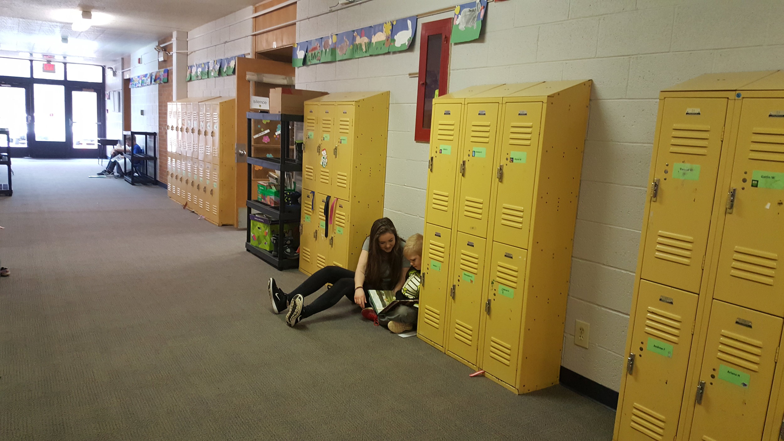 student reading to a child