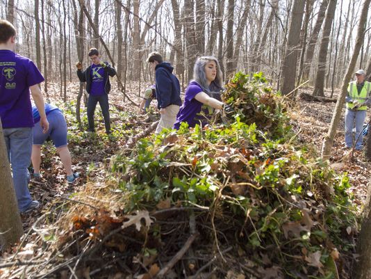 Kensington Woods High School students helped out the community Thursday during the school's first service day.