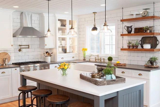 Farmhouse-style-kitchen.-Modern-Farmhouse-style-kitchen.-Farmhouse-style-kitchen-with-retro-lighting-reclaimed-wood-open-shelves-grey-island-white-perimeter-cabinets-and-brick-style-subway-tiles..jpg