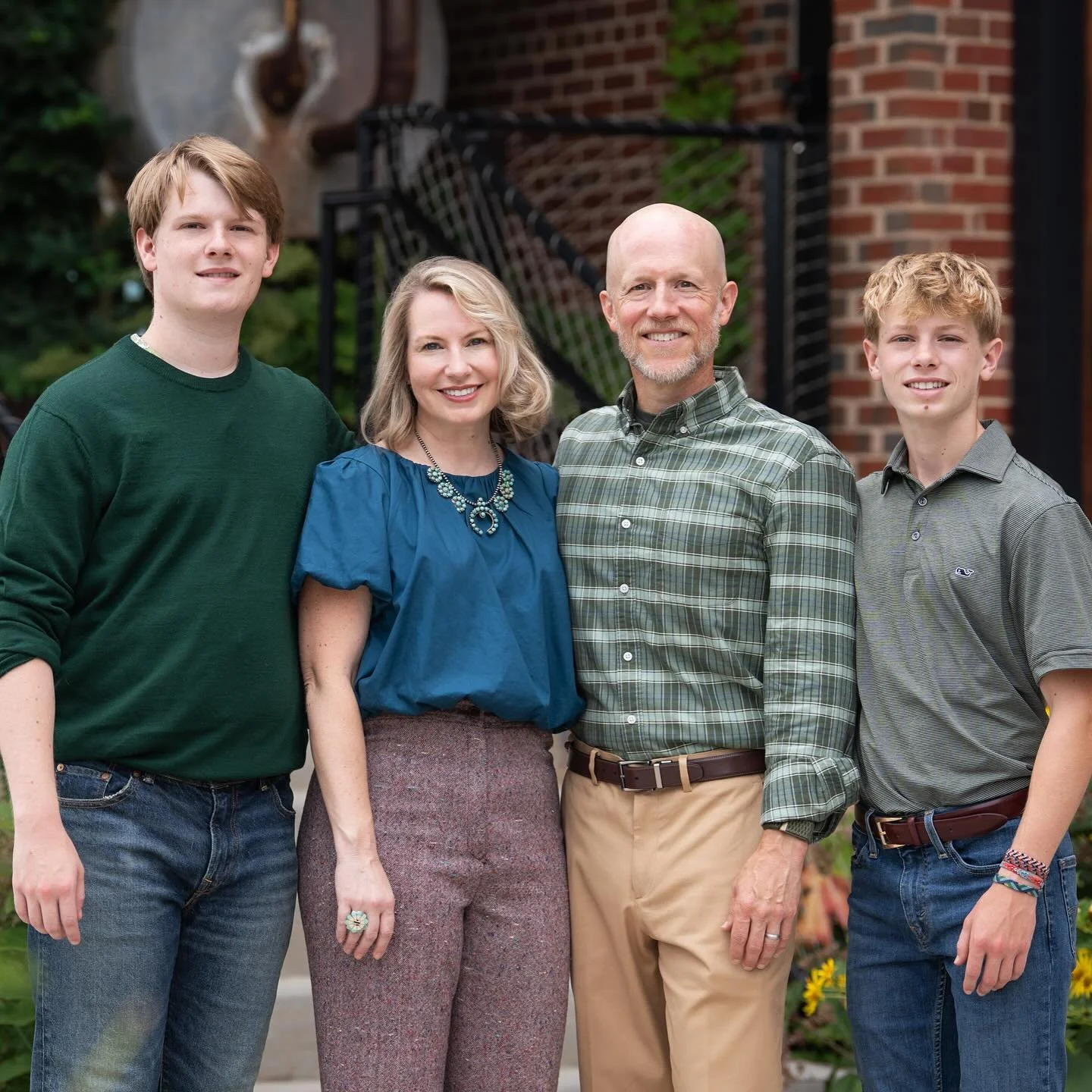 We captured these family photos after their son&rsquo;s senior portraits at Camp North End.  They were up for the adventure of exploring different places while having fun along the way. Plus Jenn is a wardrobe color consultant and stylist!  So they r