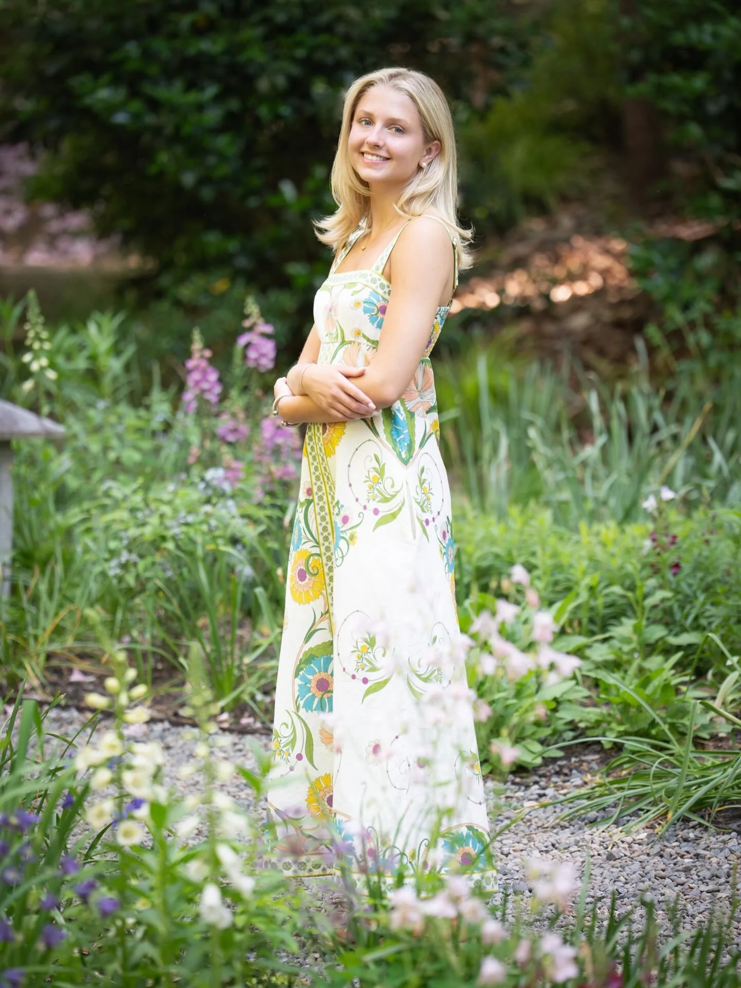 Garden senior session with this beauty!  Her dress blended so well with all the flowers.  Really enjoyed photographing Mae a few years after photographing her sister.