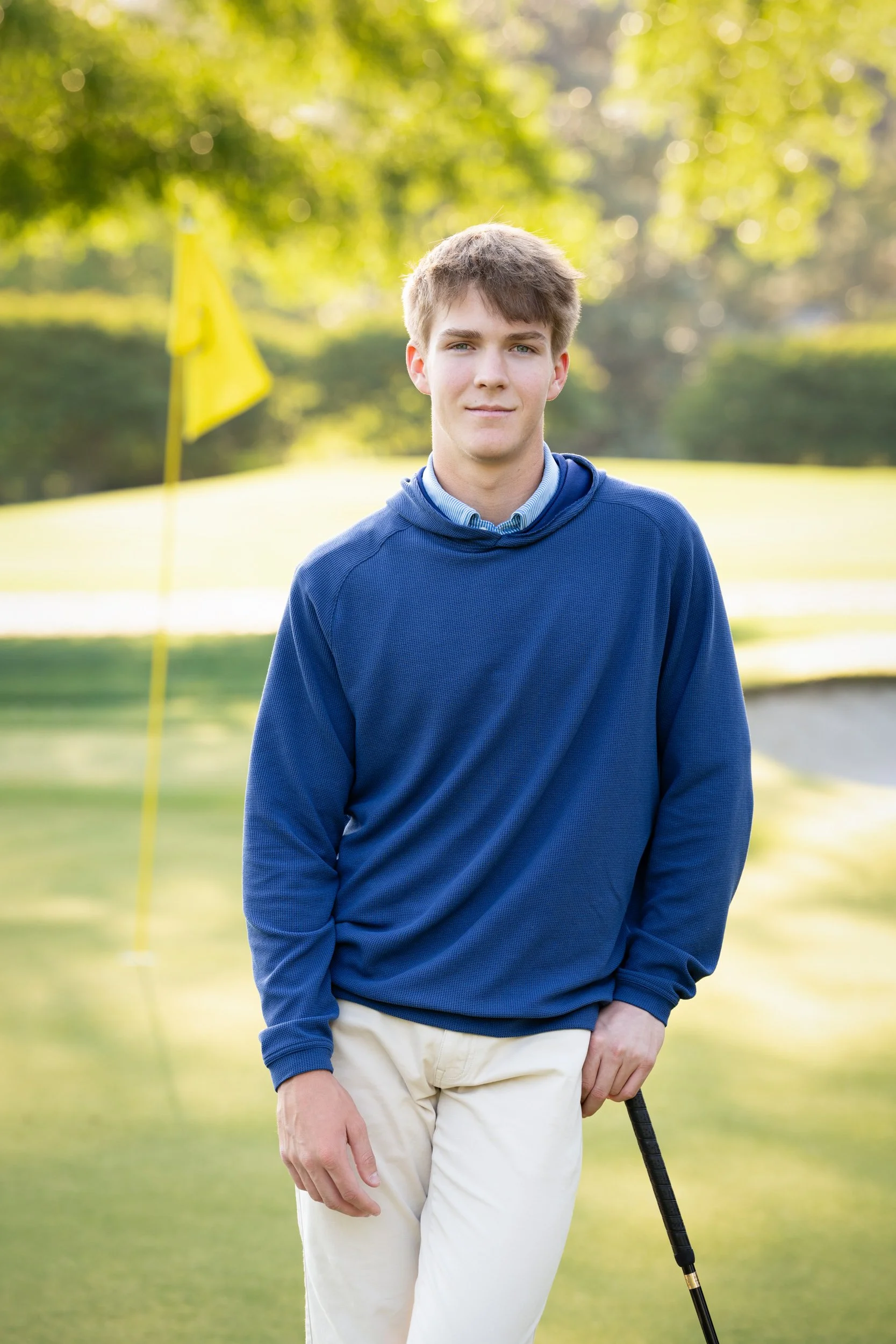  High School senior golfer photographed at Quail Hollow Country Club for high school senior portraits with Amy V. Boswell Photography 