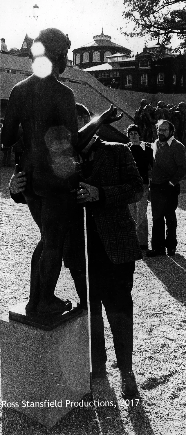 Blind man seeing a sculpture at the Hirschorn