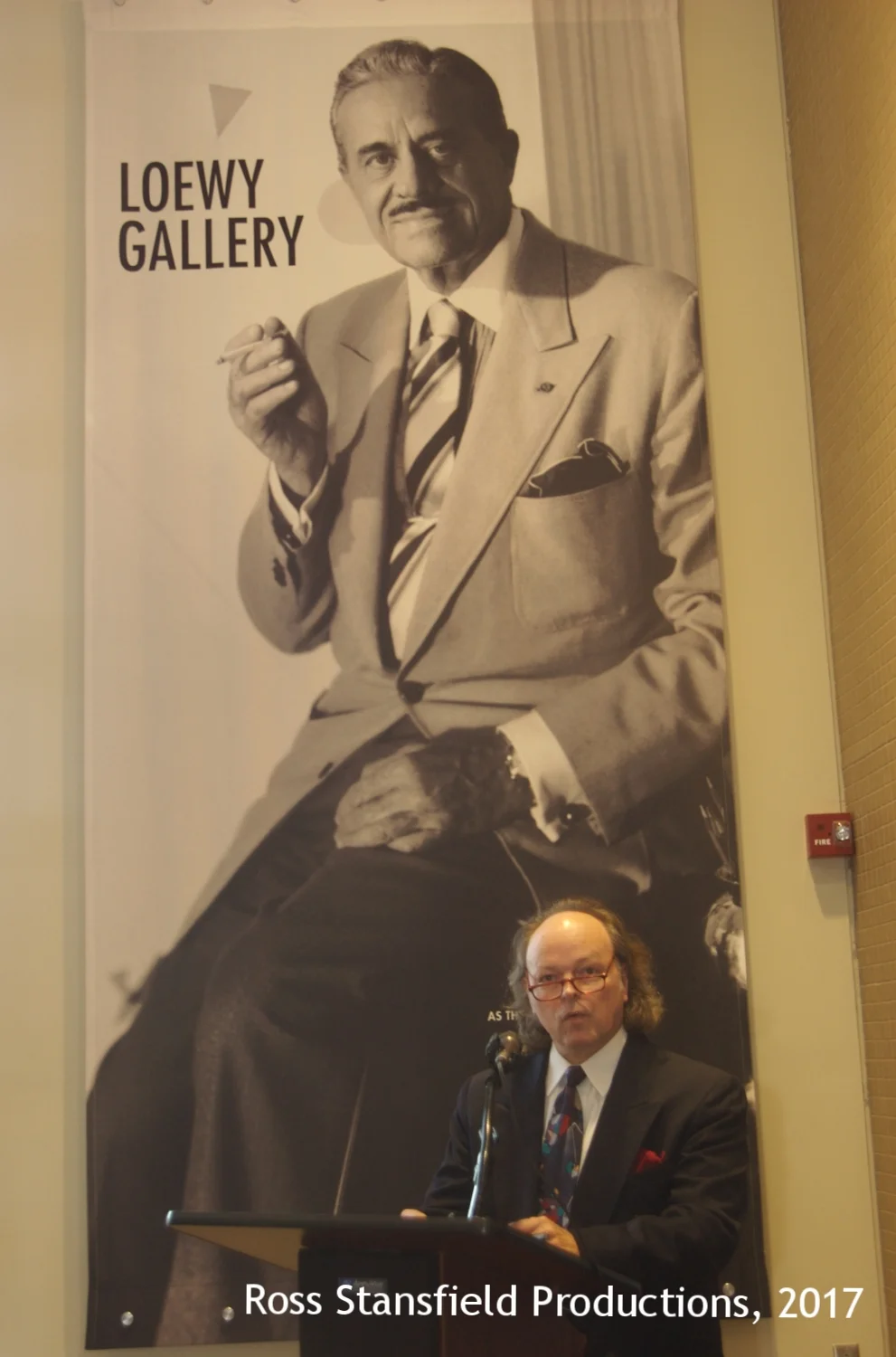 David Hagerman addresses the crowd at the Loewy Gallery Opening