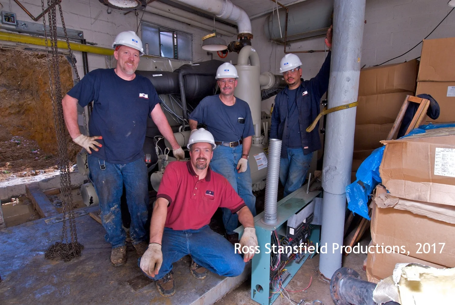 ACI Team with boiler installed.