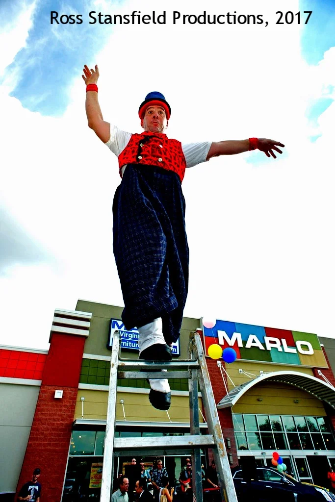 Mark Lohr balances on the top of my eight foot ladder!