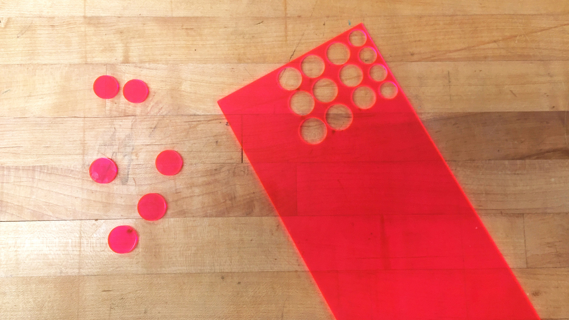testing "eye" sizes for the best friction fit, laser-cut from acrylic