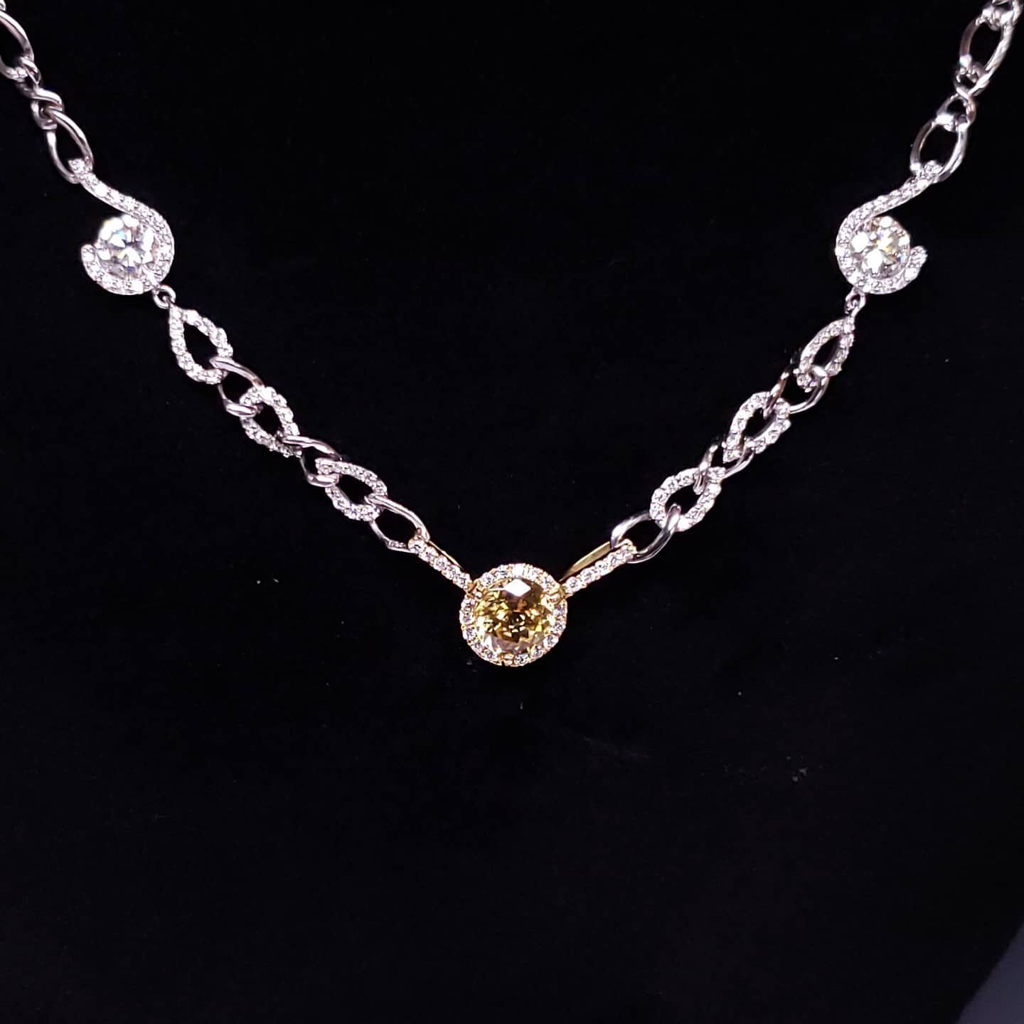 Custom 18k white gold, yellow Zircon and diamond necklace. We were able to incorporate their original pair of diamond studs and earring jackets into the design.
A perfect gift for the clients 2020 zoom meetings

#lynnjewelers #diamond #diamonds #neck