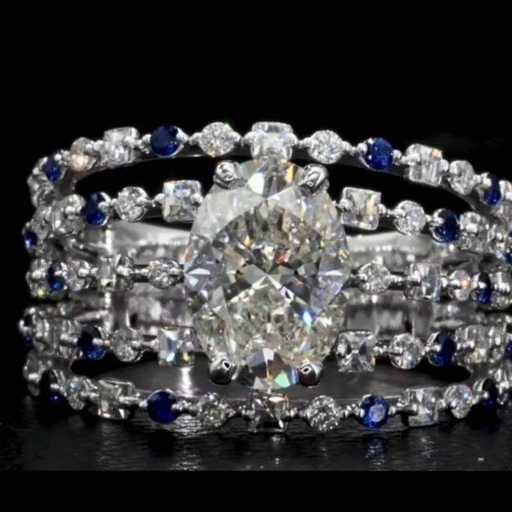 From a CAD design to a stunningly made diamond and sapphire ring to a happily engaged couple...what could be better. So happy I could design and make this for them!
18k white gold ring with a 1.5ct oval diamond center, accented with round diamonds, B