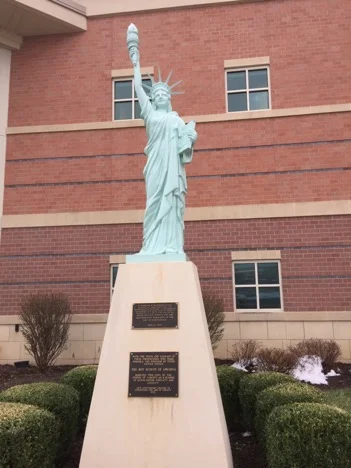 Statue of Liberty replica in front of the Midwest Genealogy Center, originally donated by the Boy Scouts of America in 1950; then restored in 2008 by the Mayor and City Council and the Beautification Commission of the City of Independence. Photo by Anne Marie Lyons