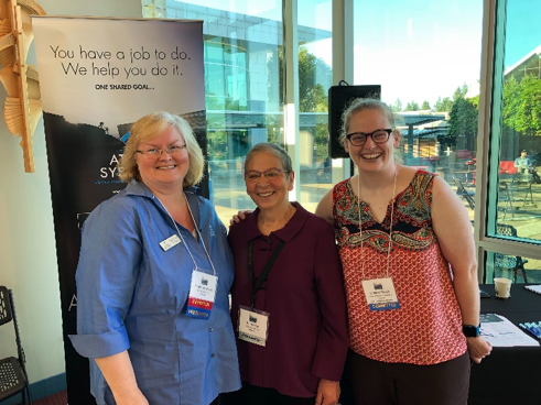 Pictured left to right: Stephanie Spires of Atlas Systems, NWILL Keynote Speaker Nancy Pearl, and Summer Steele of Oregon Health and Science University.