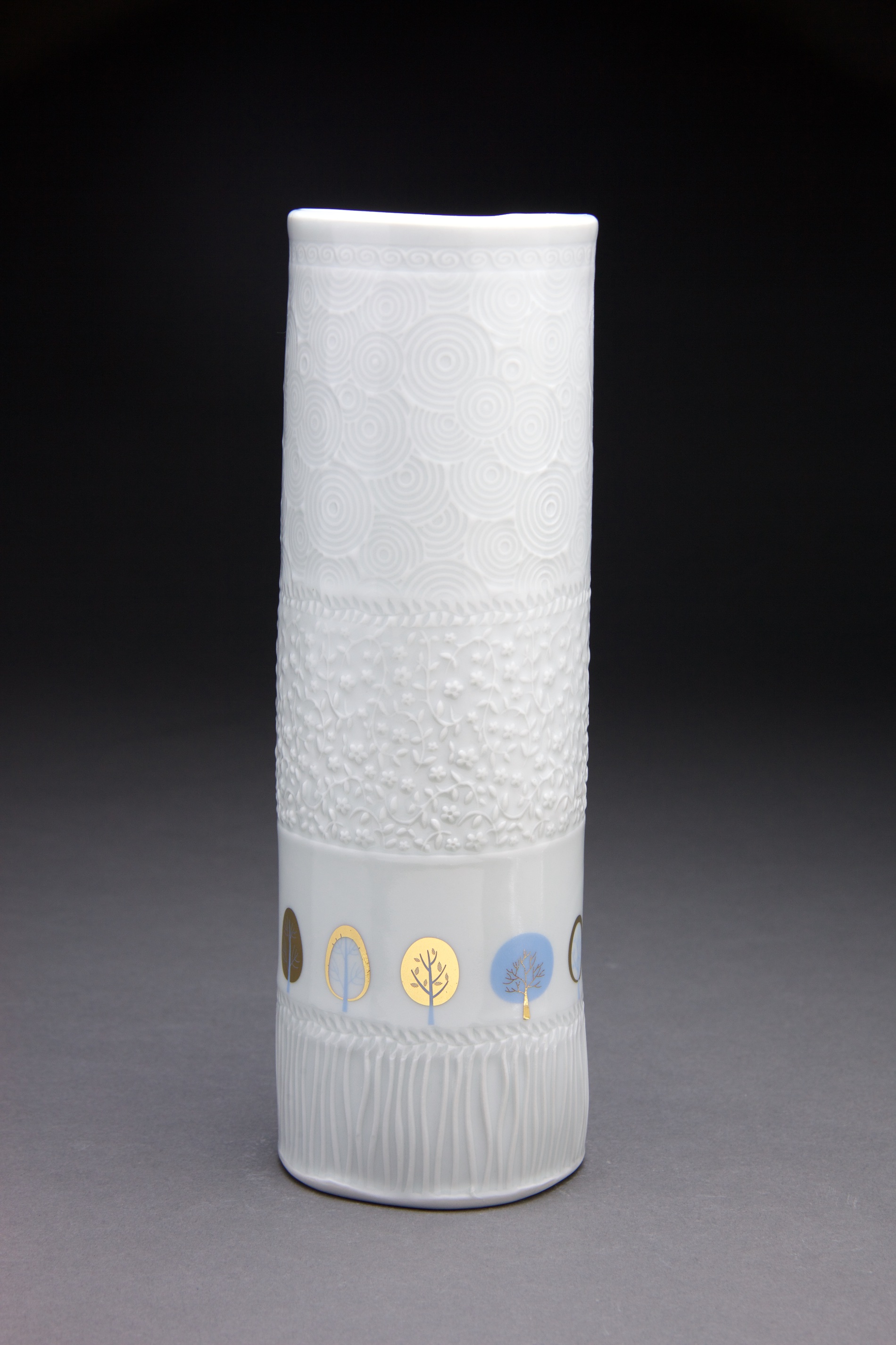 4x4x12 in vase. Clear glaze with gold decals