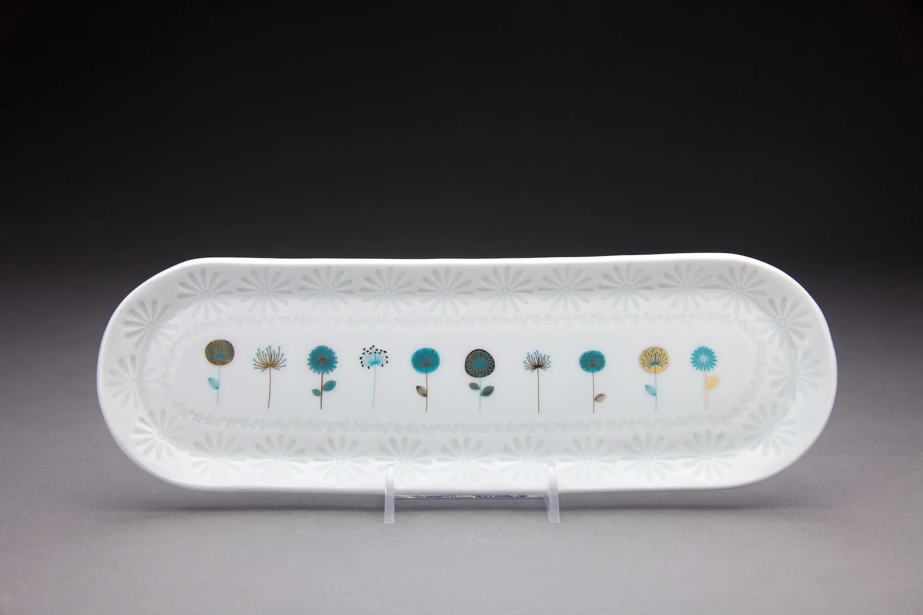 4 x 10in oval with clear glaze. gold decals