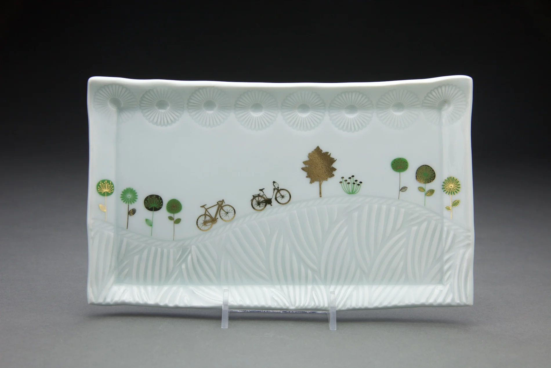 6x10in with clear glaze and gold decals.