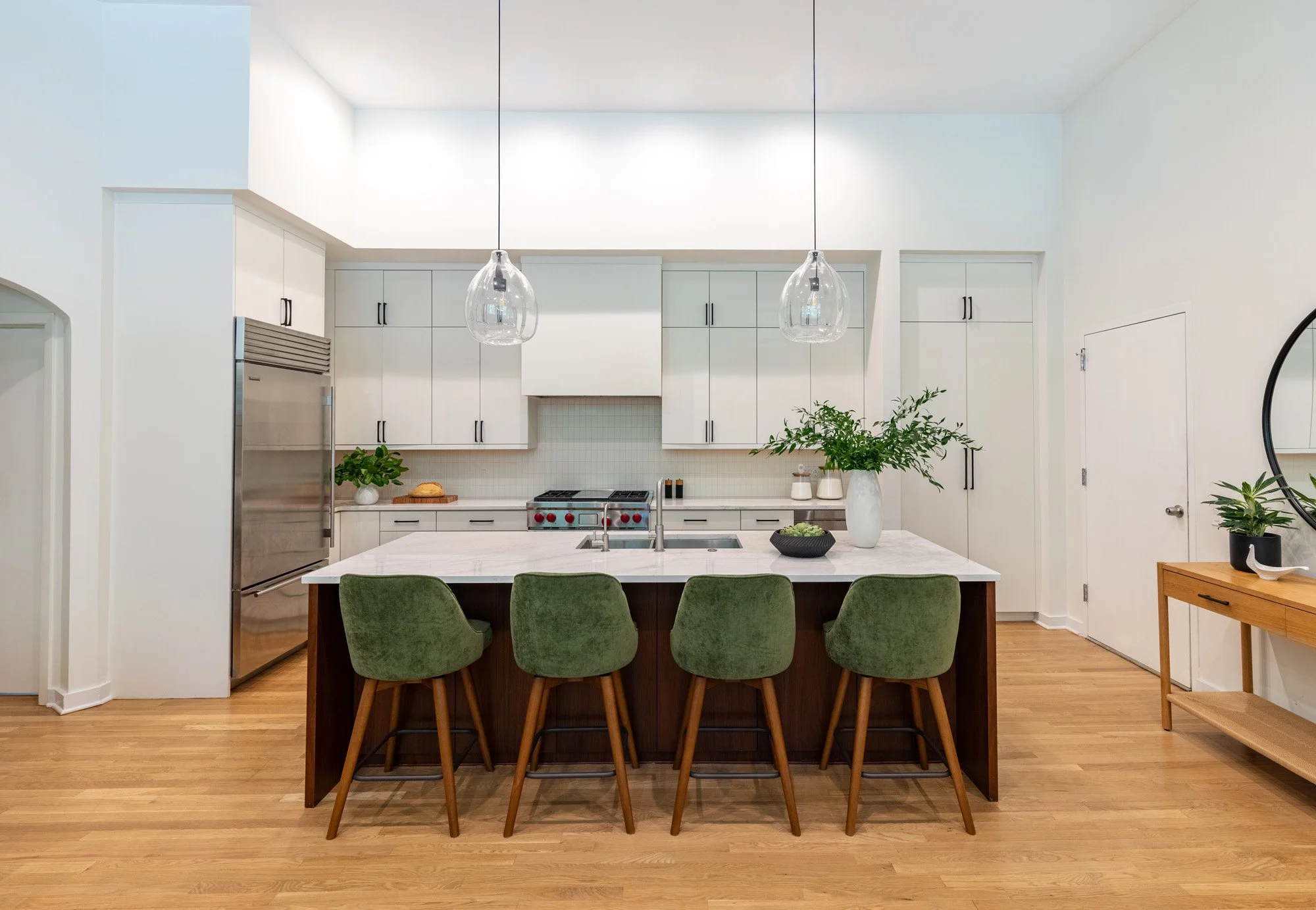 Lincoln Park, Chicago Modern Kitchen with Walnut Island and Green Barstools