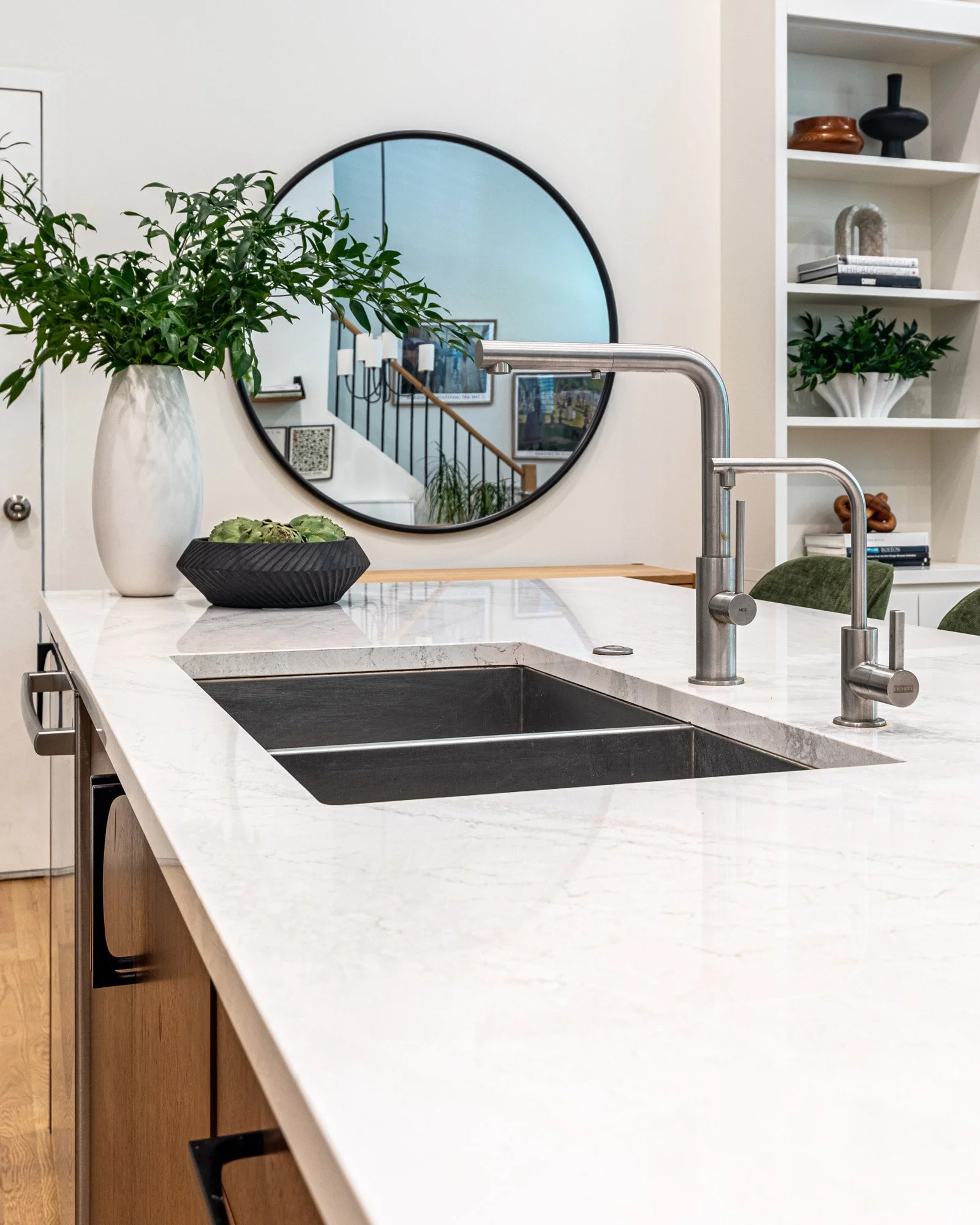 Lincoln Park, Chicago open-concept kitchen designed by Wendy Nobriga Interiors connecting the kitchen and living room for everyday living and entertaining.
