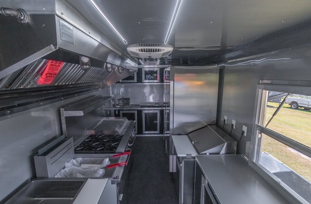 Custom Trailer Pros - black food trailer with large porch on rear Vin 82878-36.jpg