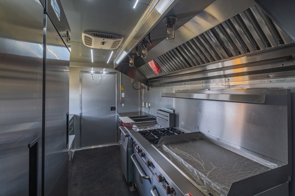 Custom Trailer Pros - black food trailer with large porch on rear Vin 82878-20.jpg