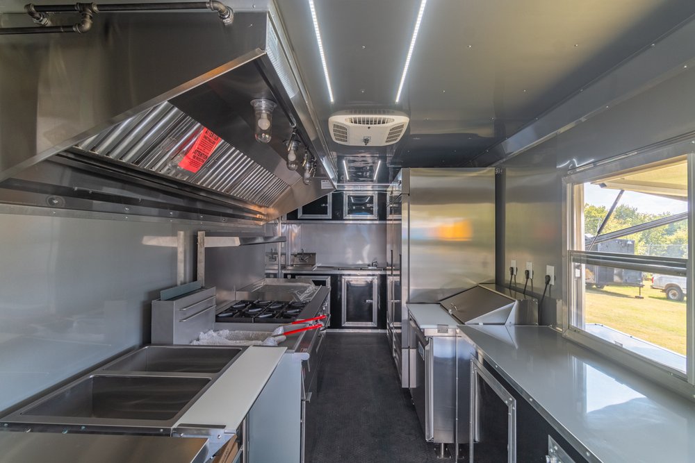 Custom Trailer Pros - black food trailer with large porch on rear Vin 82878-12.jpg