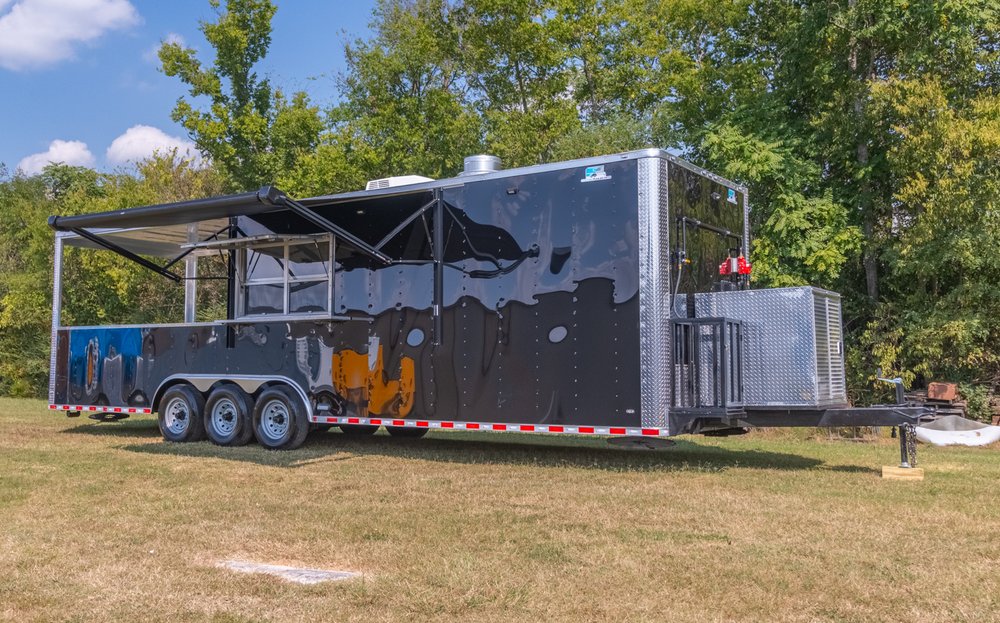 Custom Trailer Pros - black food trailer with large porch on rear Vin 82878-3.jpg