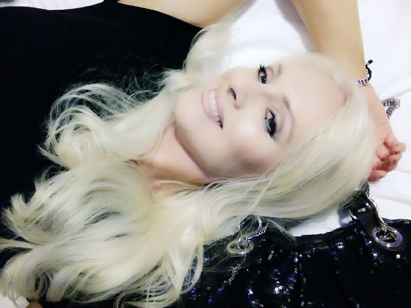 This was taken with my most inexpensive Android cell phone ZTE using only the 5MP front camera and a selfie stick. I also had a fan light directly over me and since I didn't have someone with a light to hold on my face, I brightened up the photo right on the camera before I published it. I also used different variations of the same photo's I took as I posted them on instagram combining filters and effects to create the add below. 