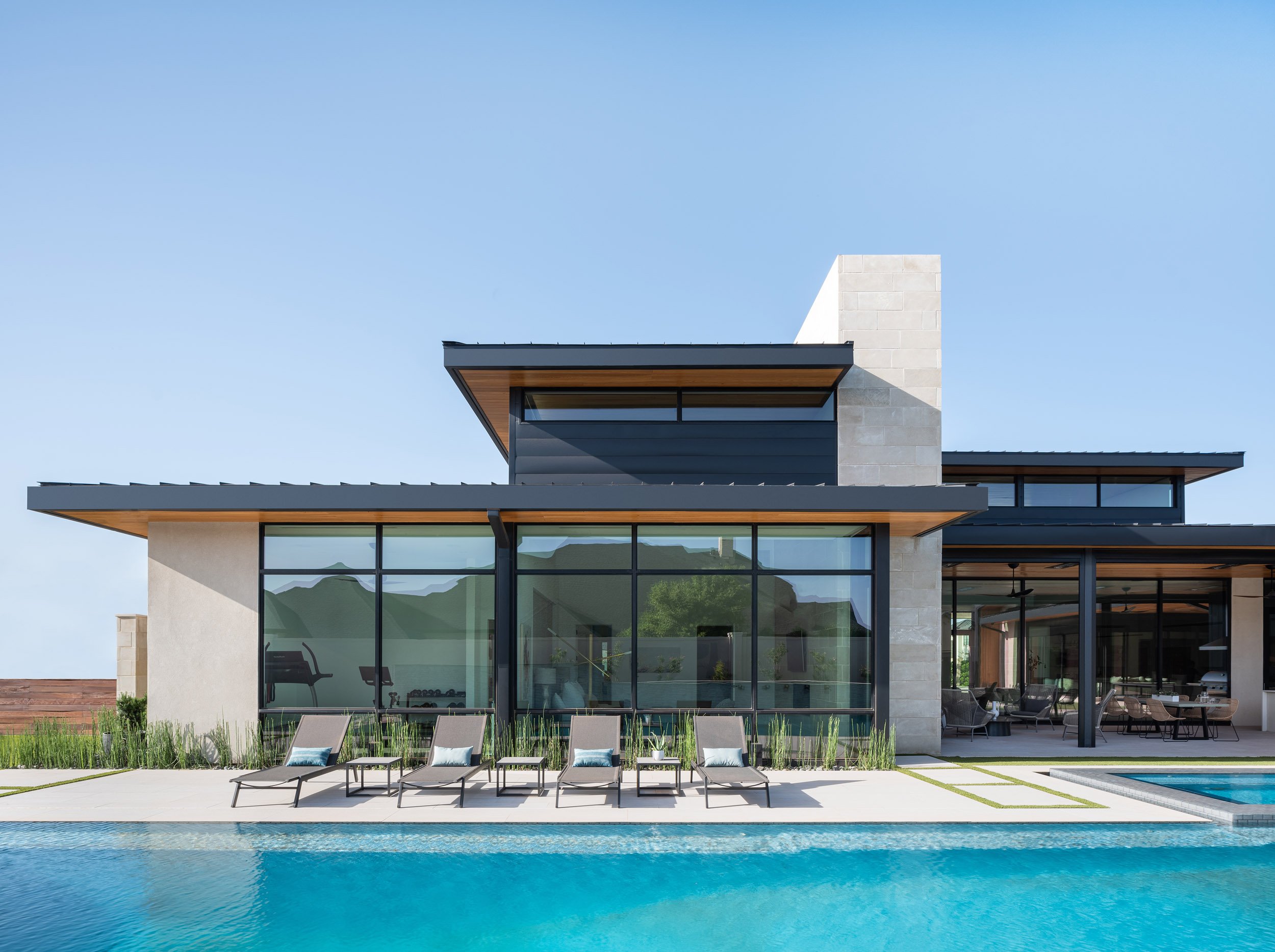  Lubbock Lines - an expansive and exquisitely detailed modern desert home by Austin Architects Dick Clark + Associates &amp; Samantha Voges Interior Design, with landscaping by Double B Design. 
