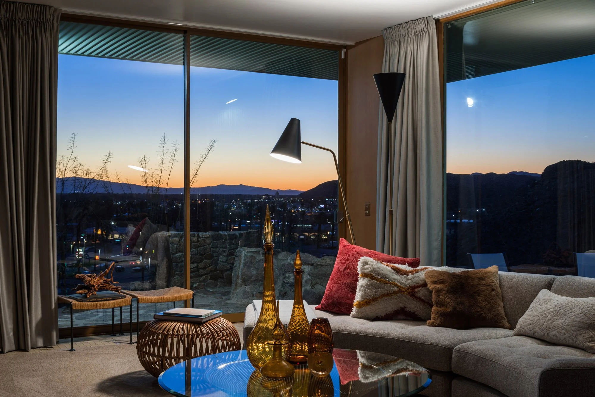 Interior image of Albert Frey's Cree House with sunrise over the coachella valley