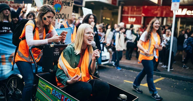 Sophie leading the SchoolStrike4Climate March in September