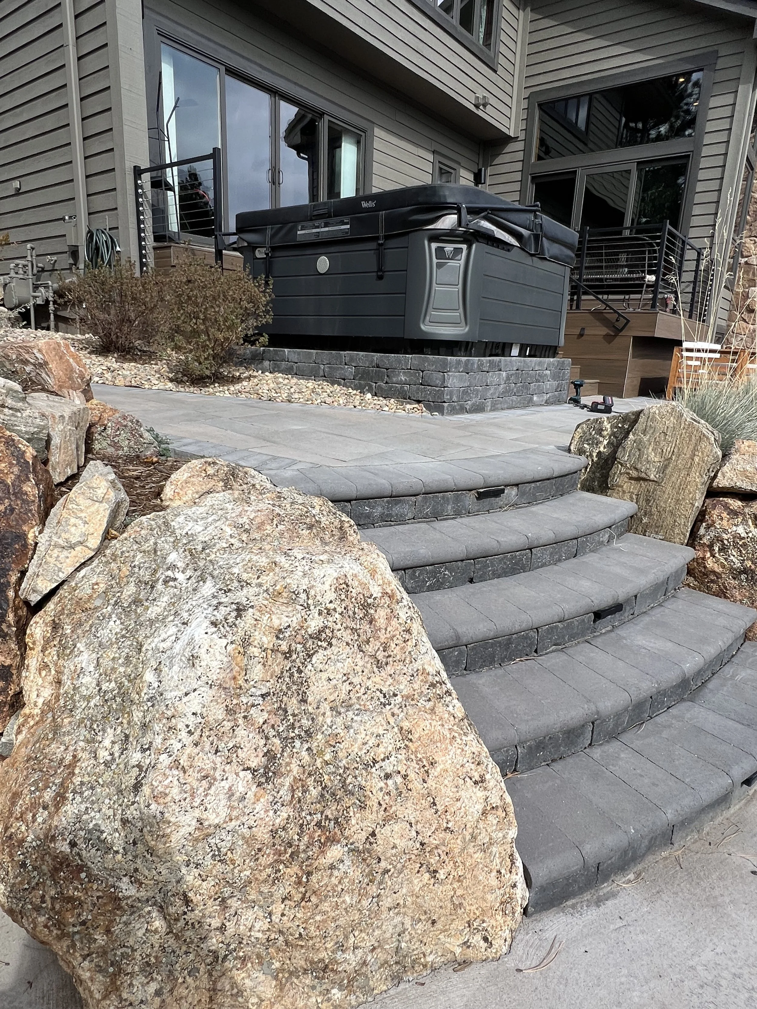 large boulder shaping staircase