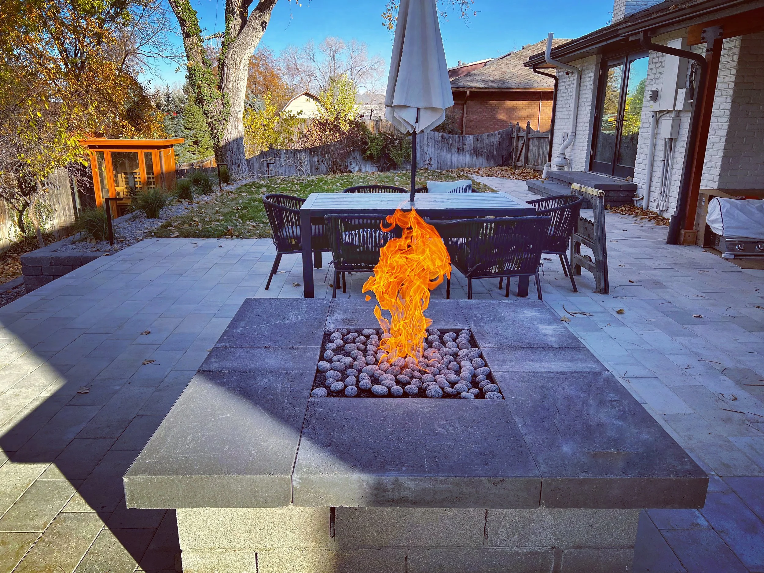 custom square fire pit with pebbles