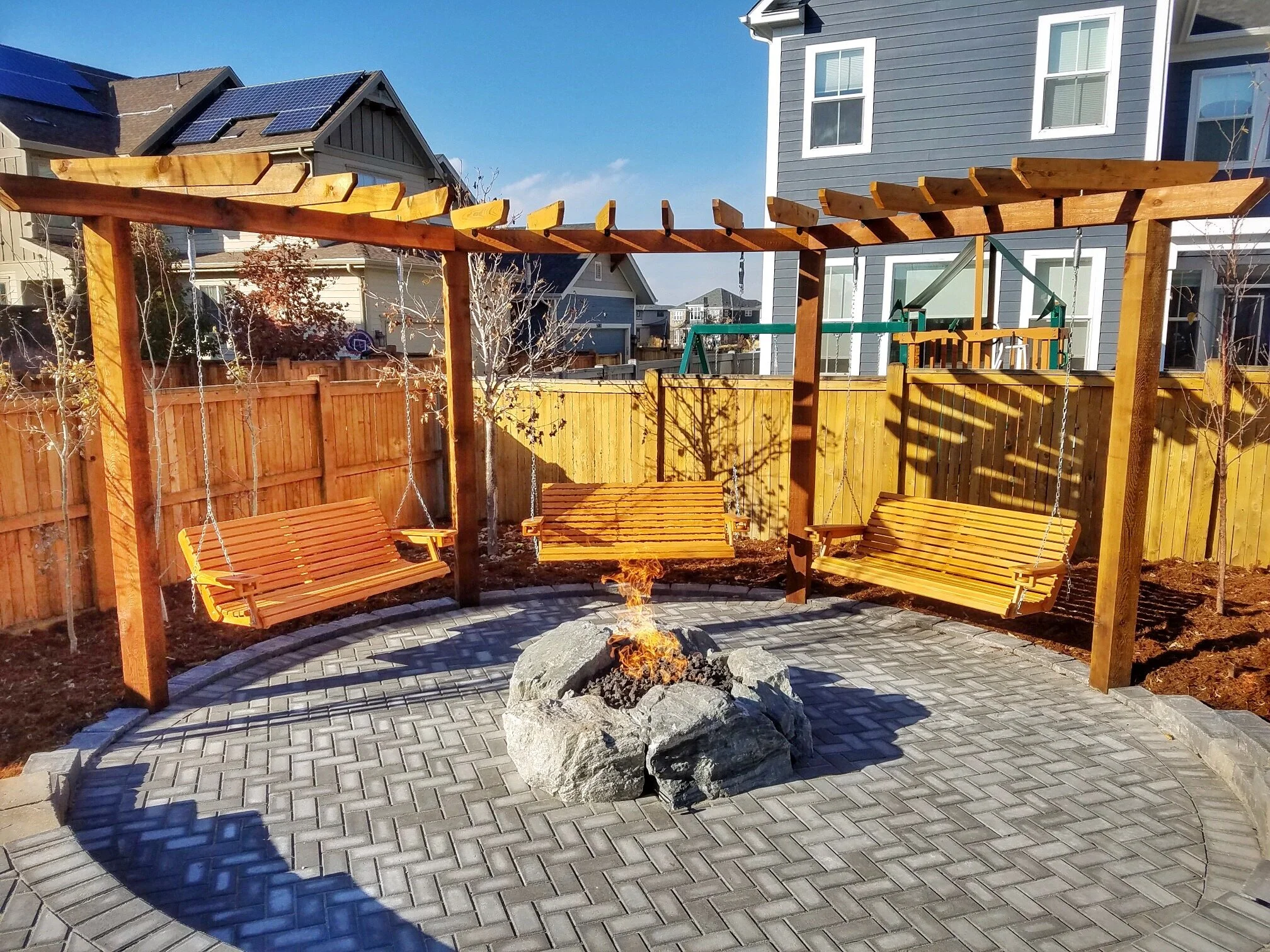 custom natural boulder fire pit
