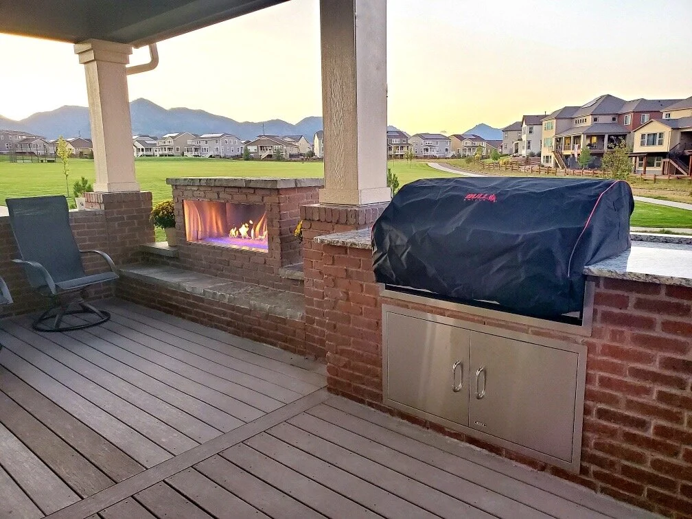 custom brick outdoor fire place and grill