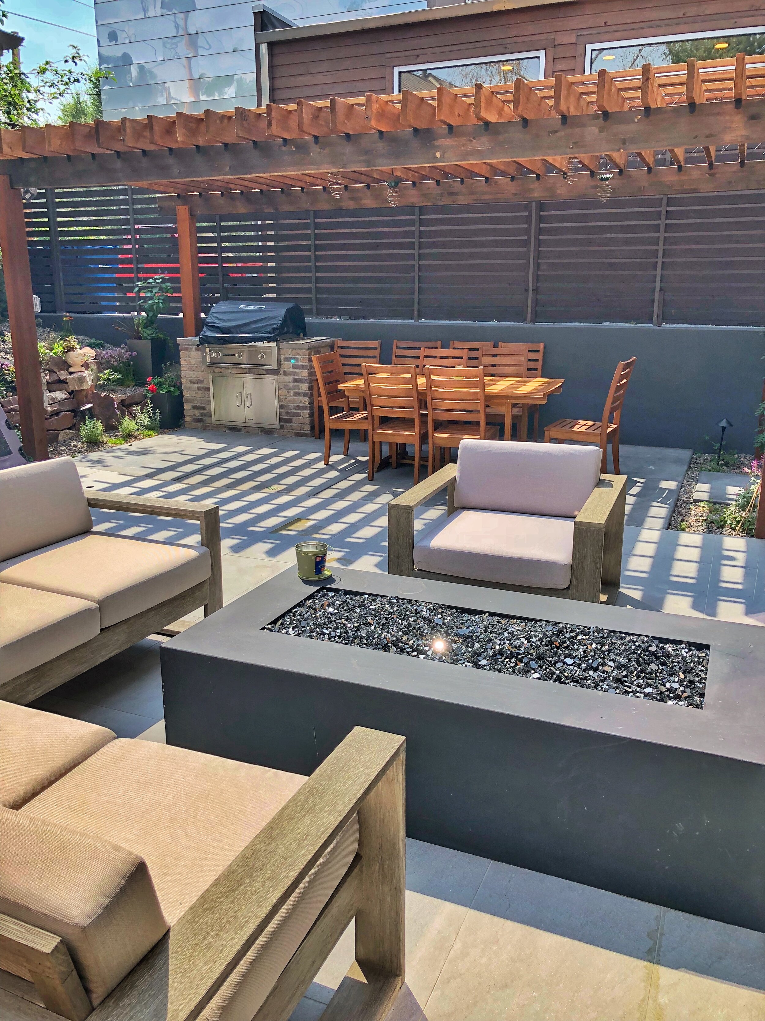 custom backyard patio pergola and privacy wall