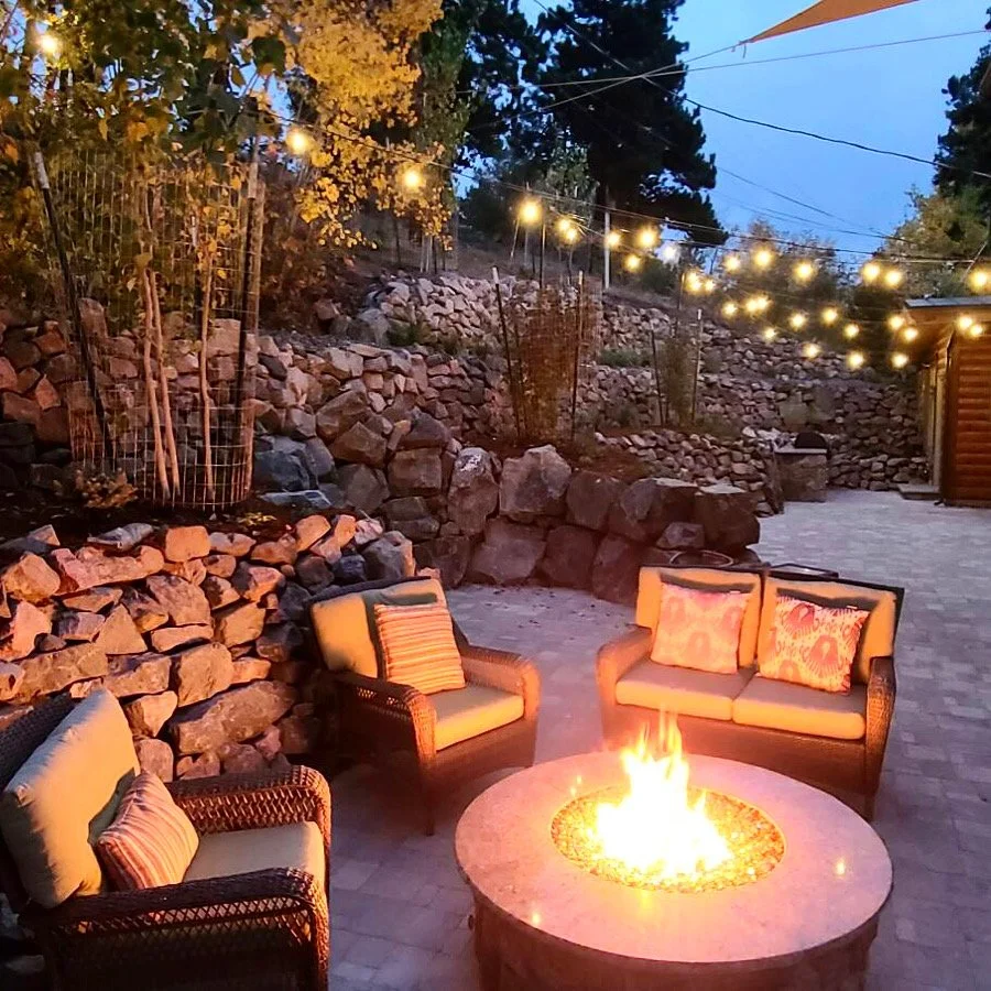 beautiful custom stone work backyard fire pit