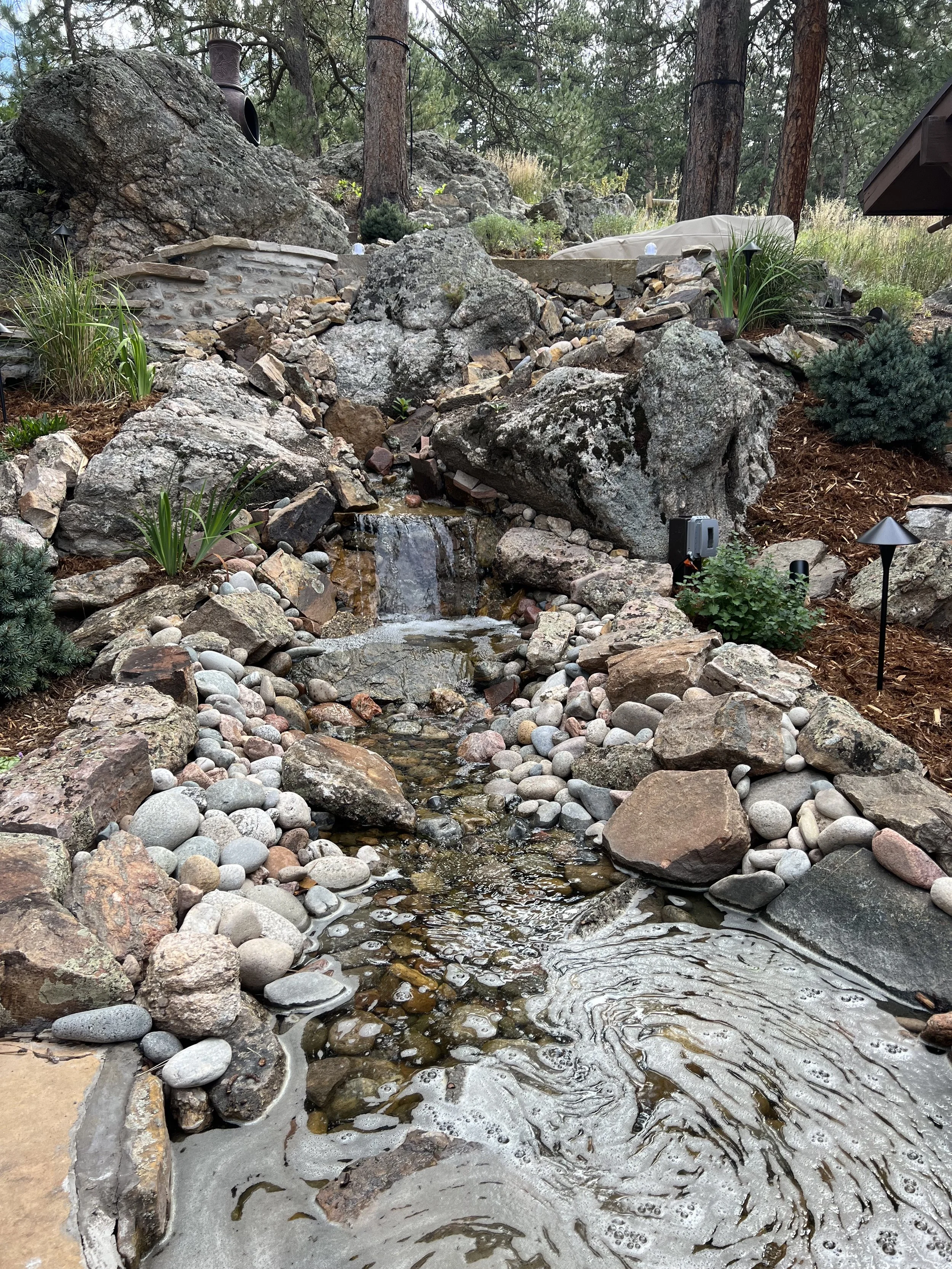 large natural mountain water fall custom built with rock