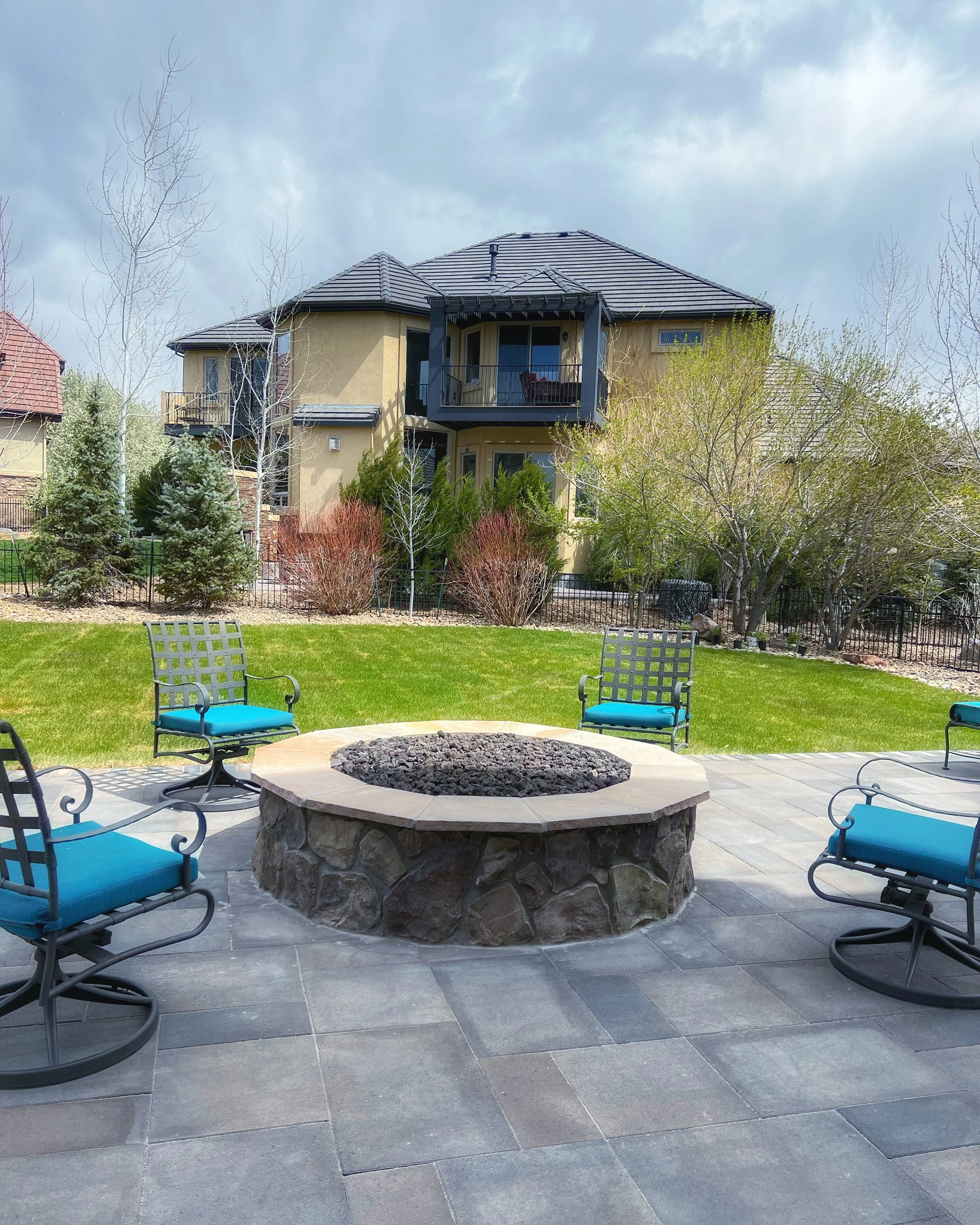 large outdoor circular stone fire pit