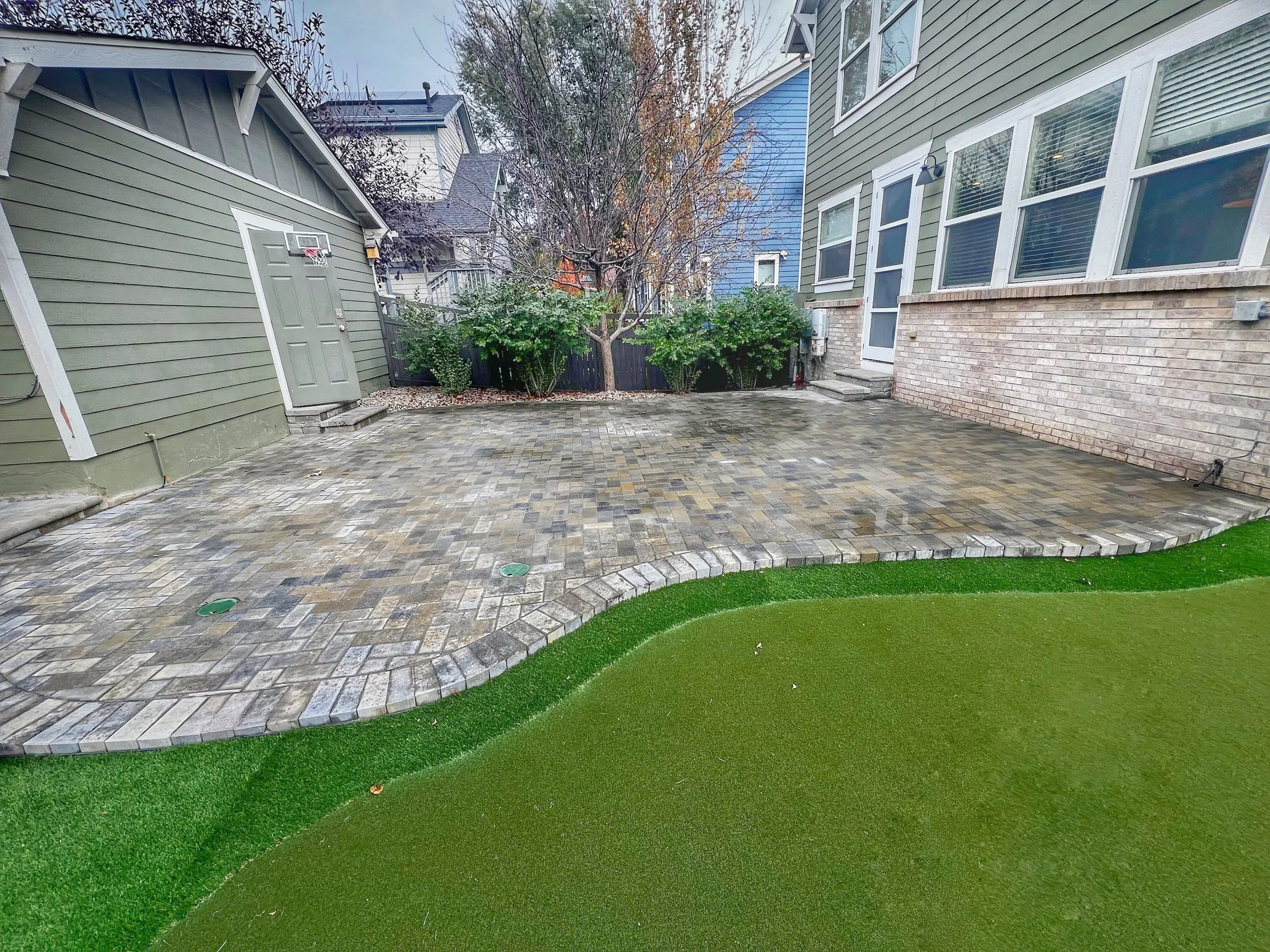 custom paver patio and putting green