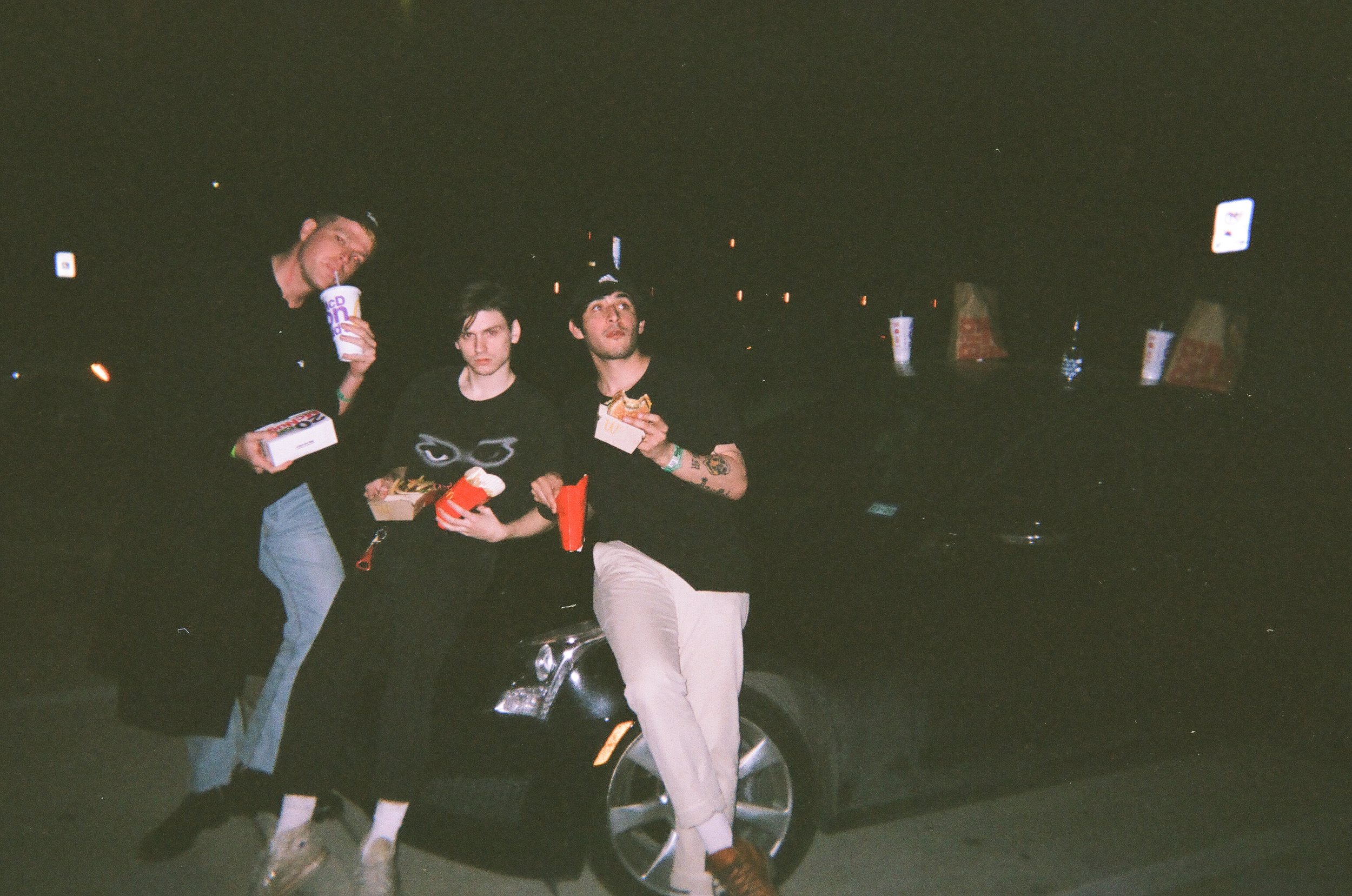  Here’s a shot of us eating McDonald’s at 3AM on the hood of the company car. 
