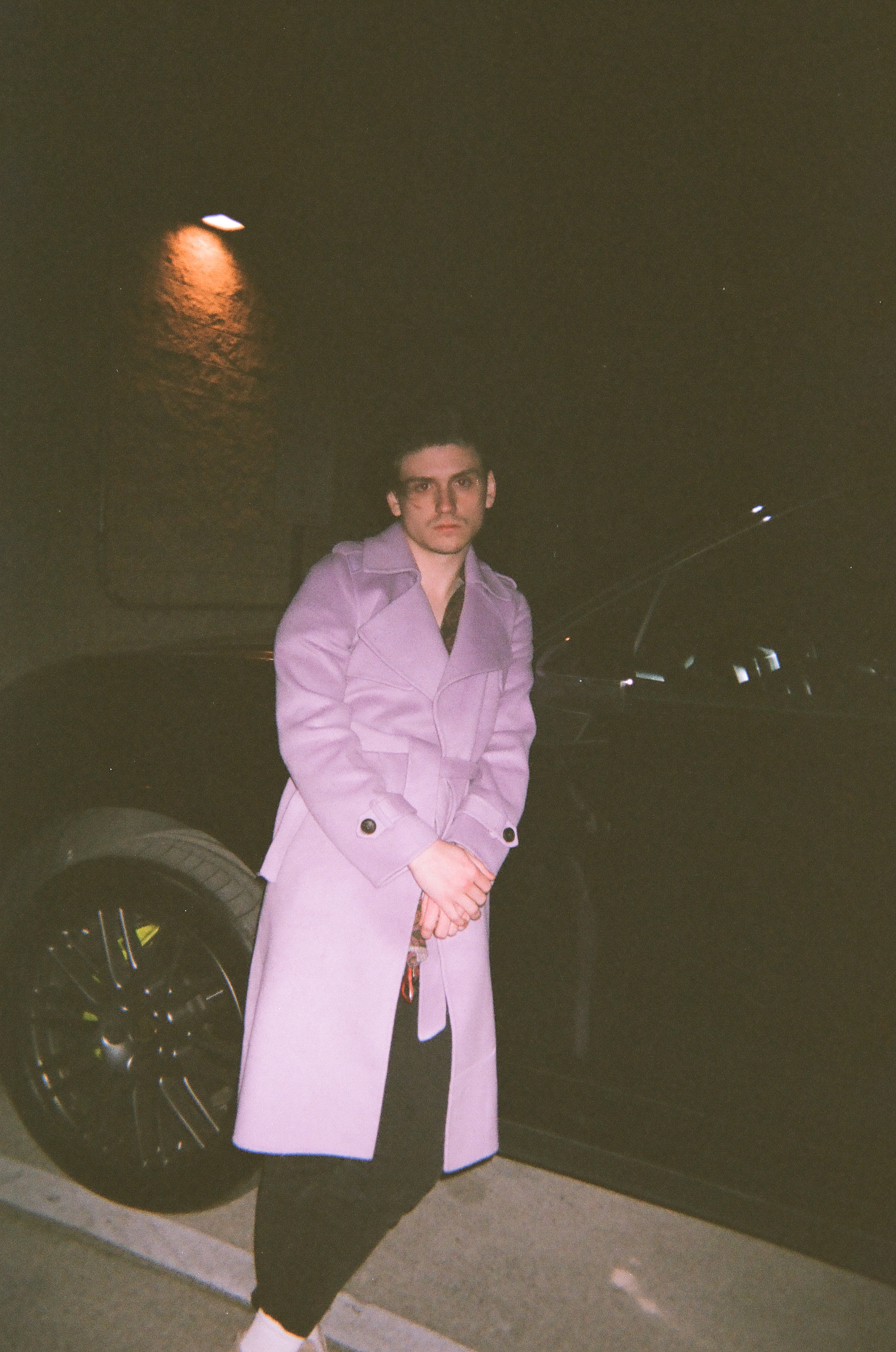 Our keyboardist Jack sporting a lavender trench coat. 