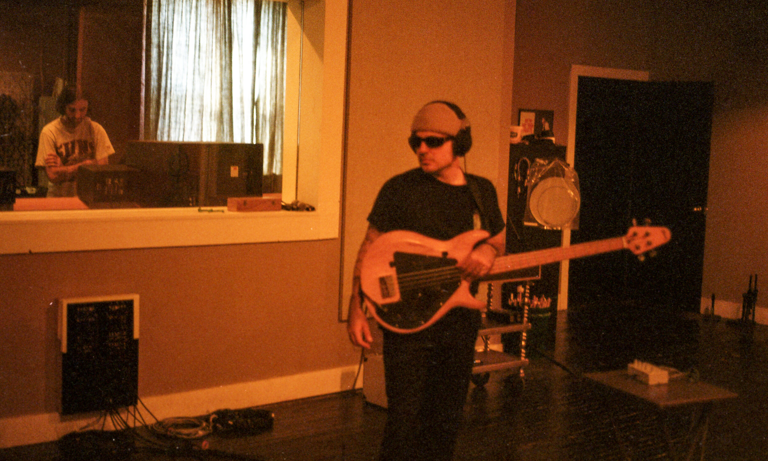 Bassist Mauricio Martinez tracking bass in the studio.