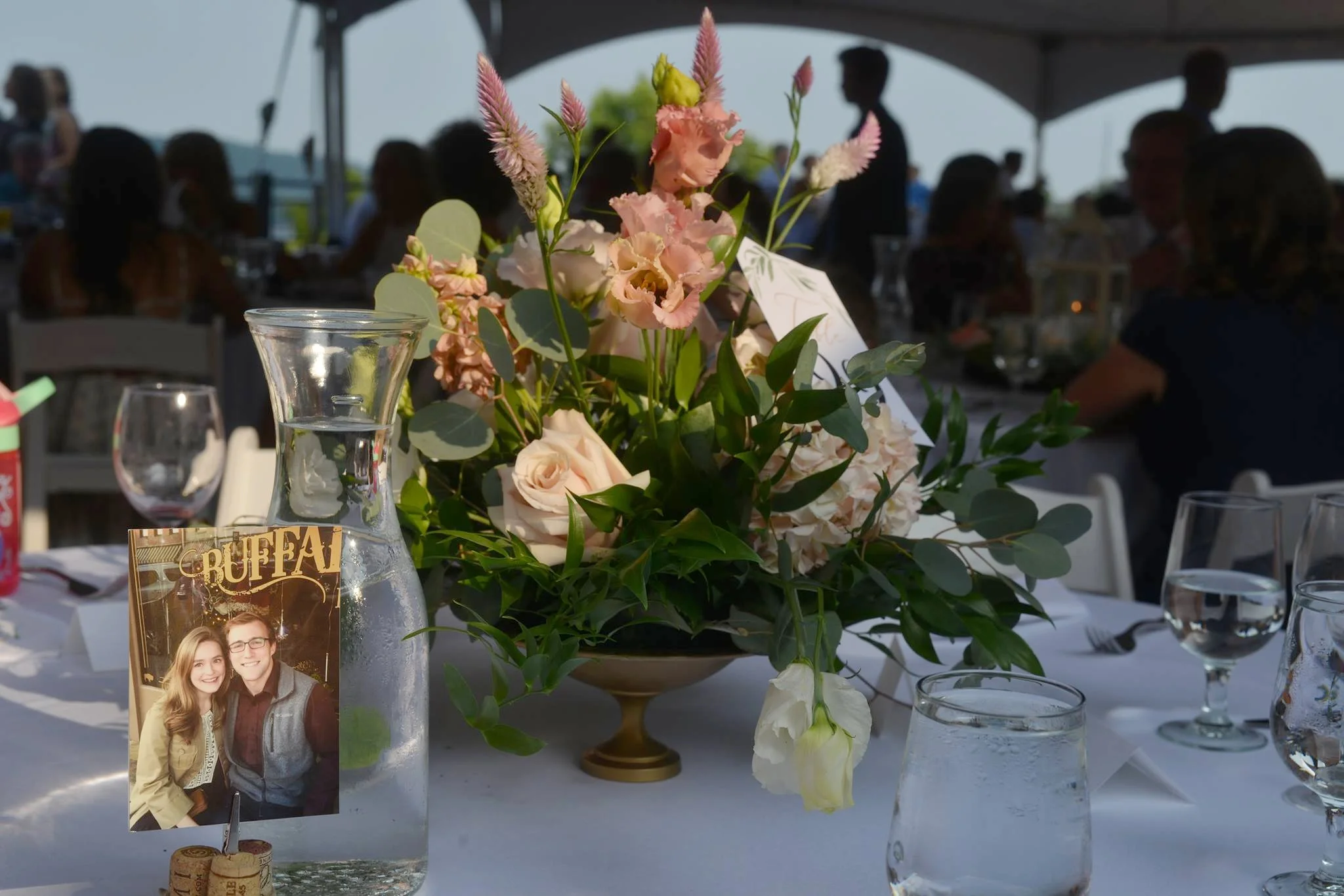 The centerpieces at sunset on the rooftop reception site! Stunning! Photo credit: Genuine Photography By Meyer