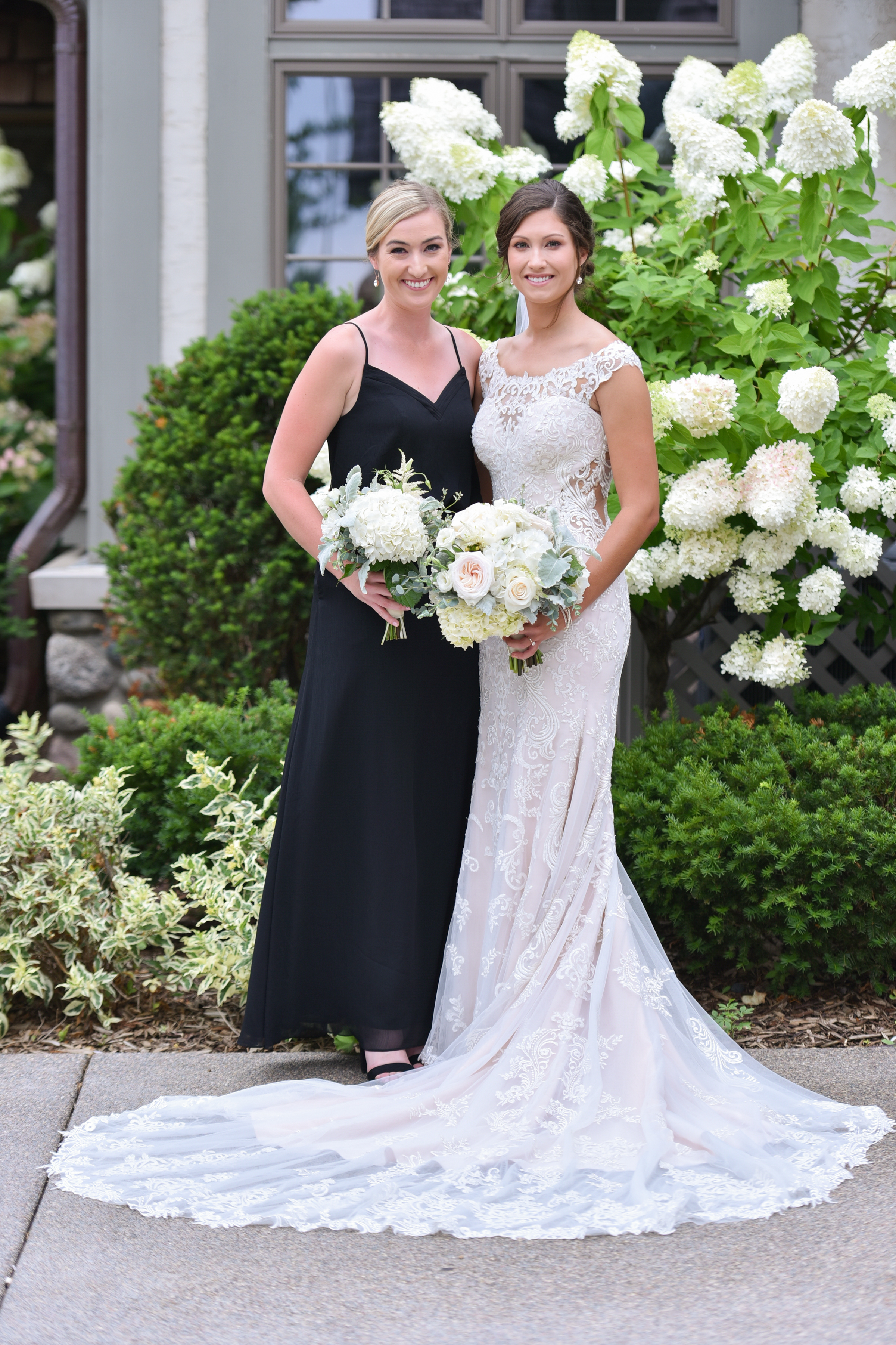 Here is one of the Flower Girls, Hailey, with the beautiful bride Mary. They grew up playing golf together, and their families are friends.