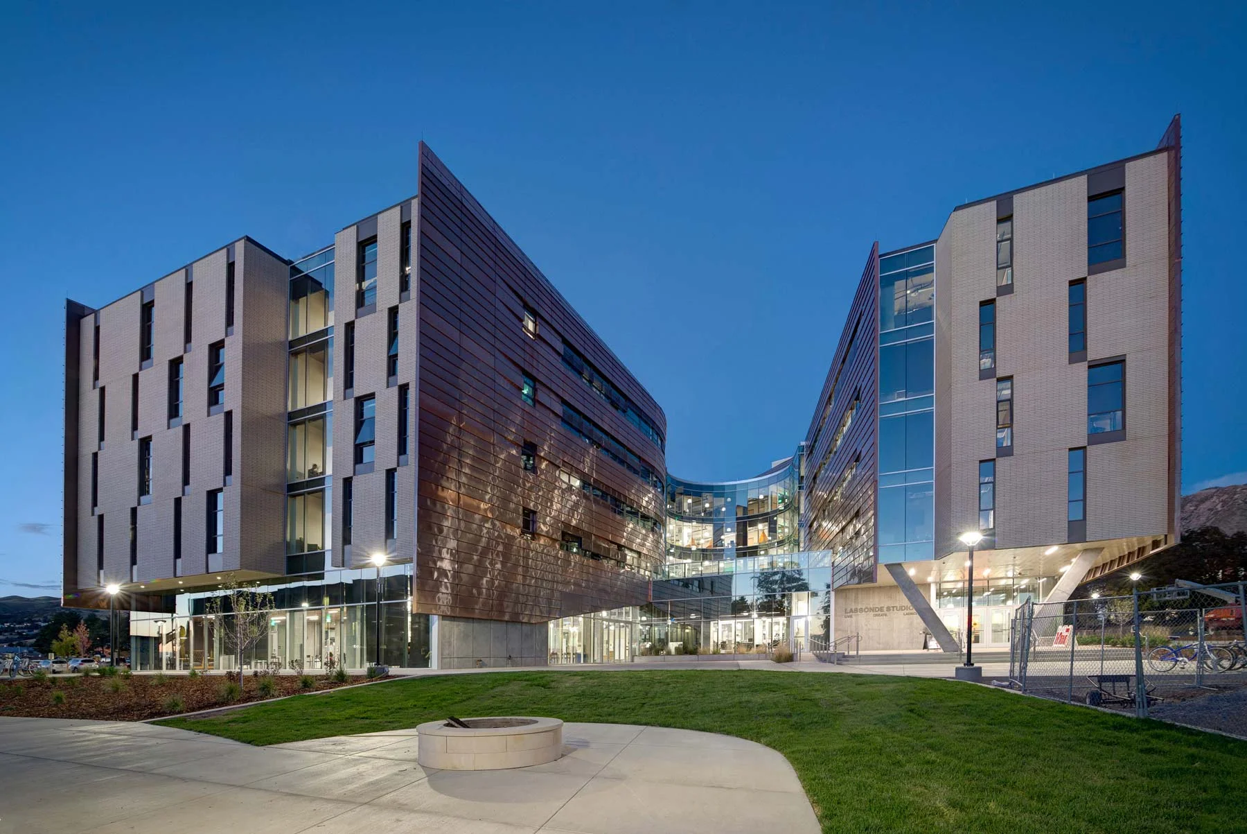 1. Recognized as one of the 9 Best New University Buildings Around the World – U of U Lassonde Living Studios , (Architectural Digest Online), 2017 ( published Feb. 21, 2017 ) 2. SXSWedu Learn X Design Award – Physical Category – U of U Lassonde Living Studios , (SXSWedu Conference March 7 - winner among 15 projects from around the world), 2017 3. New York Times - The Innovation Campus: Building Better Ideas – U of U Lassonde Living Studios , ( New York Times , published Aug. 4, 2016) 4. Bloomberg - University of Utah's New Dorm Mimics Google HQs – U of U Lassonde Living Studios , ( Bloomberg Businessweek , published July 16, 2014) 5. Fast Company - Lassonde Studios is a $45M Experiment in Education – U of U Lassonde Living Studios , ( Fast Company , published Feb. 27, 2017) 6. Utah Business - Year One at Lassonde Studios: International Praise, Architecture Awards and Student Success – U of U Lassonde Living Studios , ( Utah Business , published May 4, 2017) 7. Business Insider - There's a sprawling college building in Utah where 400 students live, sleep, and study to be entrepreneurs around the clock – U of U Lassonde Living Studios , ( Business Insider , published Oct. 28, 2017) 8. Business Wire - U of Utah Recruiting the '400 Best Student Entrepreneurs' – U of U Lassonde Living Studios , ( Business Wire , published Mar. 23, 2015) 9. Utah Technology Council - International Praise, Architecture Awards and Student Success Highlight First Year in New Home for Student Entrepreneurs at the University of Utah – U of U Lassonde Living Studios , ( Utah Technology Council , published May 3, 2017) 10. Associated Press - University of Utah Unveils $45M Entrepreneur Institute – U of U Lassonde Living Studios , ( Associated Press , published Sept. 22, 2016) 11. Trillions.biz - University of Utah Opens New $45 Million Student Housing Center – U of U Lassonde Living Studios , ( Trillions.biz , published Oct. 2, 2016) 12. Guth Award for Innovative Lighting Design – Interior Lighting – Lassonde Living Studios, (IES Utah), 2016 13. Higher Education/Research Building Project of the Year – U of U Lassonde Living Studios , (AGC Annual Awards), 2016 14. Outstanding Project of the Year in Public Category – U of U Lassonde Living Studios , (Utah Construction & Design), 2016 15. Award of Excellence - U of U Lassonde Living Studios , (AGC of Utah), 2016