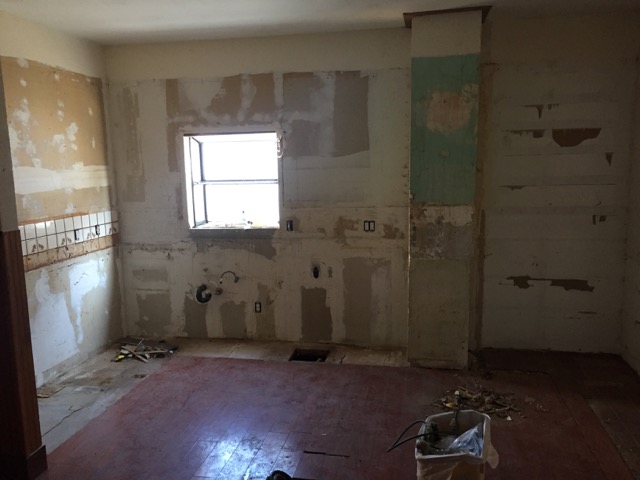 The kitchen cabinetry, counters and appliances have all been removed. Everything you see here will get demo'd to the studs next week.