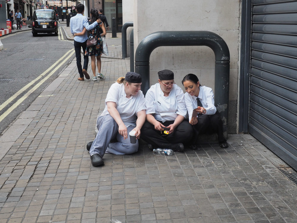  Smoke break with colleagues. 