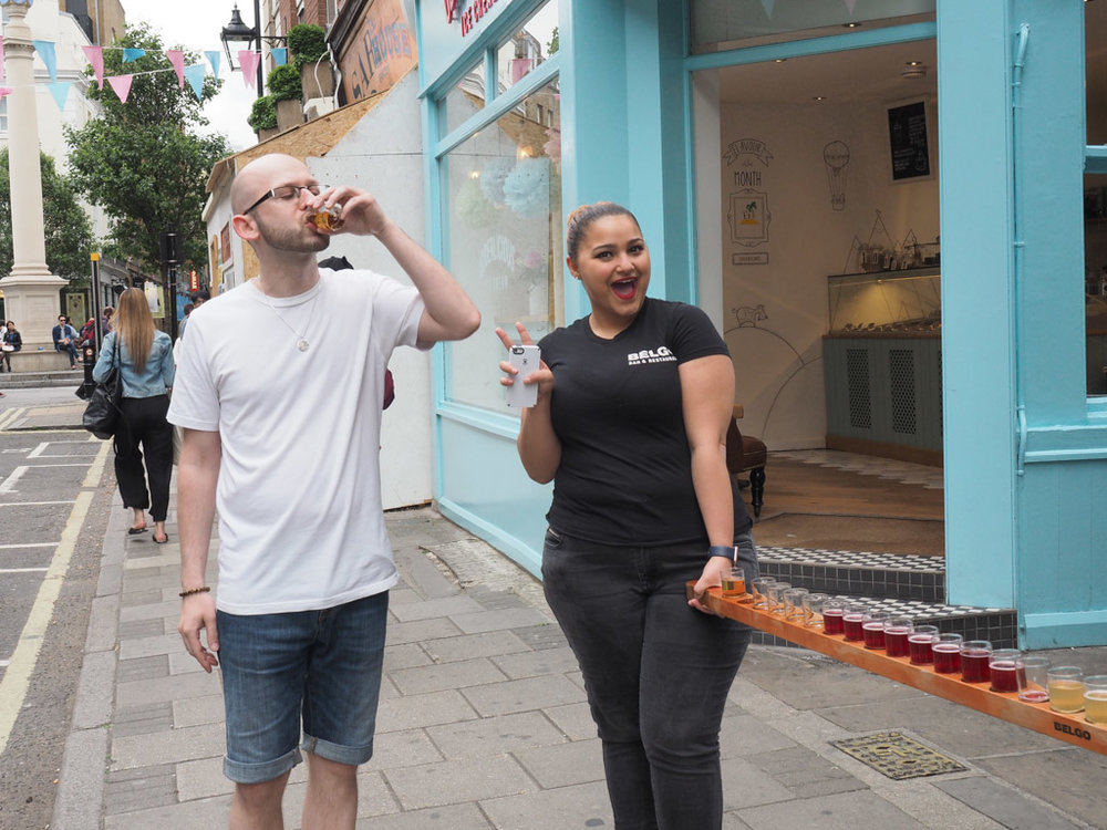  More outdoor drinking. &nbsp;A novel way to drum up patrons to your bar! &nbsp;Wander around with a beer paddle! 