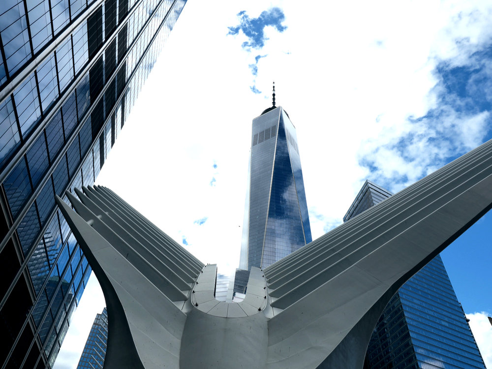  Ground Zero: View of Freedom Tower and The Oculus. &nbsp;These buildings are located around the 9/11 memorial and architectural marvels. 