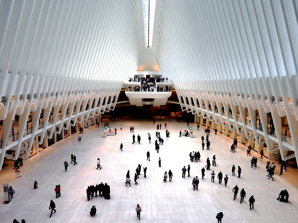  Ground Zero: The Oculus. Retail space and transportation hub. &nbsp;Walking into this space, you can't help but look around in quiet contemplation and appreciate this space - a perfect complement to the 9/11 memorial that sits adjacent. 